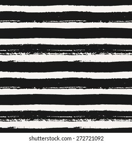 Hand drawn striped seamless pattern. Monochrome horizontal dry brush strokes texture.