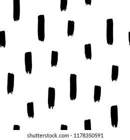 Hand drawn stripes in seamless pattern. Black and white repeatable ornament with short vertical brushstrokes. Brush flourishes on paper texture background. Textured paper for fabric, textile, paper
