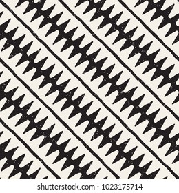 Hand drawn style abstract seamless pattern in black and white. Retro grunge freehand jagged lines texture.