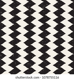 Hand drawn style abstract seamless pattern in black and white. Retro grunge freehand jagged lines texture.