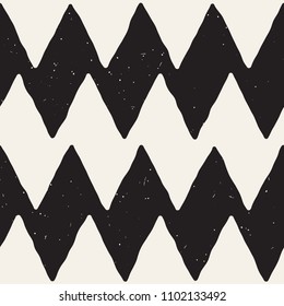Hand drawn style abstract seamless pattern in black and white. Retro grunge freehand jagged lines texture.