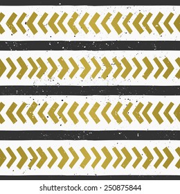 Hand drawn style chevron and lines seamless pattern. Abstract geometric repeat pattern in black and golden on white.