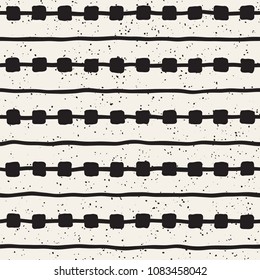 Hand drawn style ethnic seamless pattern. Abstract grungy geometric shapes background in black and white.