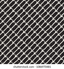 Hand drawn style ethnic seamless pattern. Abstract grungy geometric shapes background in black and white.