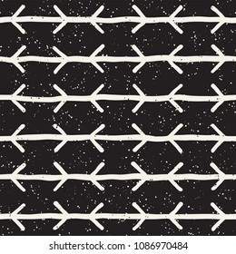 Hand drawn style ethnic seamless pattern. Abstract grungy geometric shapes background in black and white.