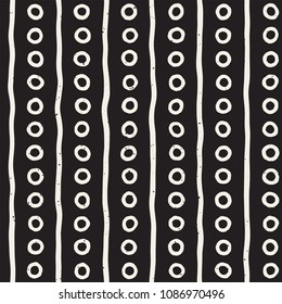 Hand drawn style ethnic seamless pattern. Abstract grungy geometric shapes background in black and white.