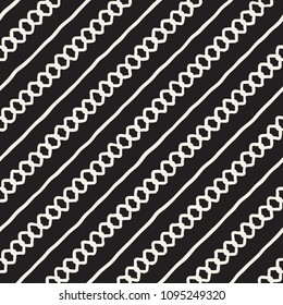 Hand drawn style ethnic seamless pattern. Abstract grungy geometric shapes background in black and white.