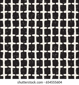 Hand drawn style ethnic seamless pattern. Abstract geometric tiling background in black and white. Vector vintage freehand doodle texture.