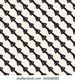 Hand drawn style ethnic seamless pattern. Abstract geometric tiling background in black and white. Vector vintage freehand doodle texture.