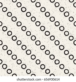 Hand drawn style ethnic seamless pattern. Abstract geometric tiling background in black and white. Vector vintage freehand doodle texture.
