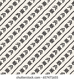 Hand drawn style ethnic seamless pattern. Abstract geometric tiling background in black and white. Vector vintage freehand doodle texture.