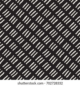 Hand drawn style ethnic seamless pattern. Abstract geometric tiling background in black and white. Vector vintage freehand doodle texture.
