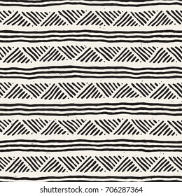 Hand drawn style ethnic seamless pattern. Abstract geometric lines tiling background in black and white.