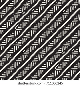 Hand drawn style ethnic seamless pattern. Abstract geometric lines tiling background in black and white.
