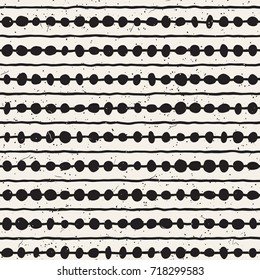 Hand drawn style ethnic seamless pattern. Abstract grungy geometric shapes background in black and white.