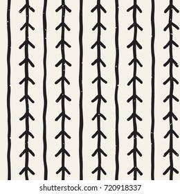 Hand drawn style ethnic seamless pattern. Abstract geometric tiling background in black and white. Vector freehand doodle texture.