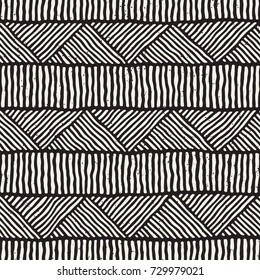 Hand drawn style ethnic seamless pattern. Abstract geometric tiling background in black and white.