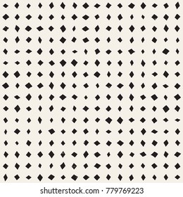 Hand drawn style ethnic seamless pattern. Abstract grungy geometric shapes background in black and white.