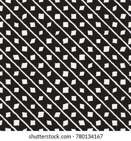 Hand drawn style ethnic seamless pattern. Abstract grungy geometric shapes background in black and white.