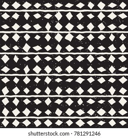 Hand drawn style ethnic seamless pattern. Abstract grungy geometric shapes background in black and white.