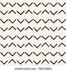 Hand drawn style ethnic seamless pattern. Abstract grungy geometric shapes background in black and white.