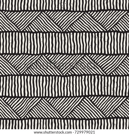 Hand drawn style ethnic seamless pattern. Abstract geometric tiling background in black and white.