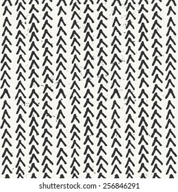 Hand drawn style geometric seamless pattern. Vintage abstract repeat pattern in black and off- white.