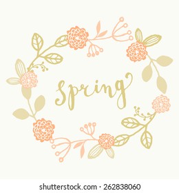 Hand drawn style spring greeting card template with hand lettered text and floral wreath.