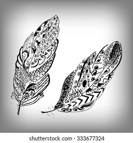 Hand drawn stylized feathers vector collection. Cute zentangle feather for your design. Elements for greeting card and postcard, henna and tattoo design