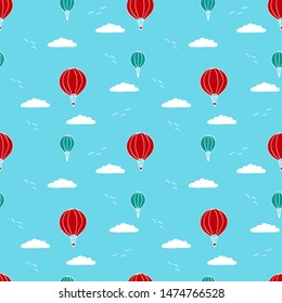 Hand drawn summer seamless pattern. Reapeated ornament with doodle hot air balloons, gulls and clouds. Vector illustration.