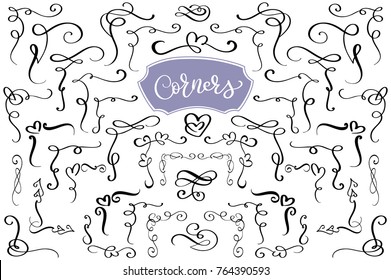 Hand drawn swirl and flourish love corners in the shape of a heart. Calligraphic design elements. Vintage Vector Illustration