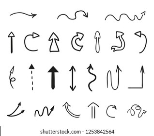 Hand drawn tangled abstract arrows on isolated white background. Line art. Set of different pointers. Black and white illustration. Doodles for artwork