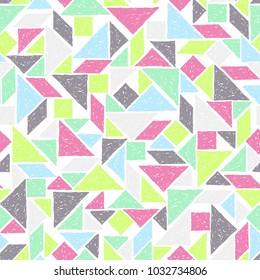 Hand drawn tangram seamless pattern in vector. Colorful abstract background of geometric shapes can be used for textile design, wallpapers and wrapping paper