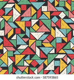 Hand drawn tangram seamless pattern in vector. Colorful abstract background of geometric shapes can be used for textile design, wallpapers and wrapping paper