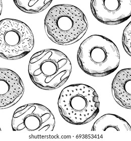 Hand drawn tasty donuts. Graphic vector seamless pattern