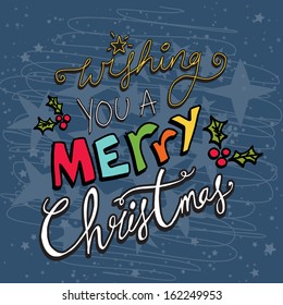 Hand drawn text on a midnight blue textured background saying Wishing you a Merry Christmas