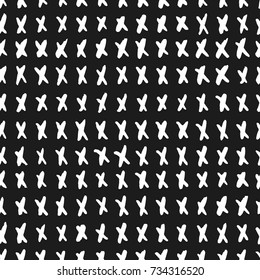 Hand drawn texture. Crosses, grungy lines, brush strokes, seamless pattern made with ink. Black and white Scandinavian style fabric pattern