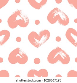 Hand drawn texture. Hearts, brush strokes, seamless pattern made with ink. Artistic fabric pattern. Valentine's day background