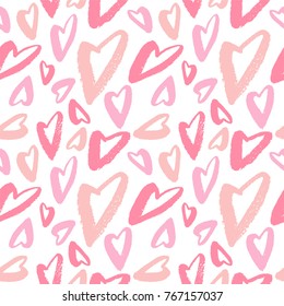 Hand drawn texture. Hearts, brush strokes, seamless pattern made with ink. Artistic fabric pattern. Valentine's day background