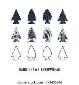 Hand drawn textured arrowheads vector illustrations set.