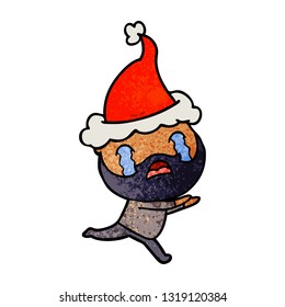hand drawn textured cartoon of a bearded man crying wearing santa hat
