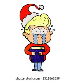 hand drawn textured cartoon of a crying man holding book wearing santa hat