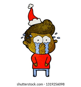 hand drawn textured cartoon of a crying man wearing santa hat