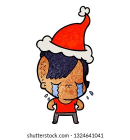 hand drawn textured cartoon of a crying girl wearing santa hat