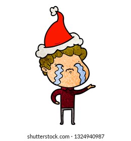 hand drawn textured cartoon of a man crying wearing santa hat