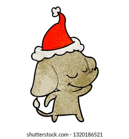 hand drawn textured cartoon of a smiling elephant wearing santa hat