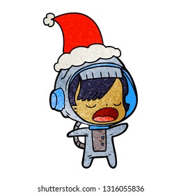 hand drawn textured cartoon of a talking astronaut woman wearing santa hat