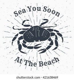 Hand drawn textured grunge vintage label, retro badge or T-shirt typography design with crab vector illustration. Text Sea you soon, at the beach.