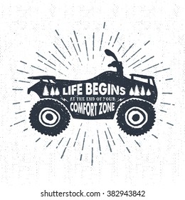 Hand drawn textured label with quad bike vector illustration and "Life begins at the end of your comfort zone" inspirational lettering.