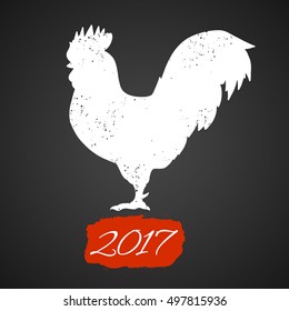 Hand drawn textured stylized silhouette red rooster on blackboard background. 2017 symbol. Vector illustration. Can be used as a logo, for website background, greeting cards, calendar, printing